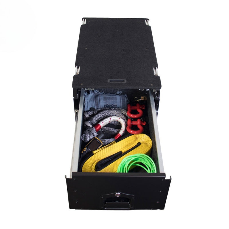 overland-vehicle-systems-cargo-box-and-cargo-box-with-working-station-black-top-view-opened-drawer-with-tools-on-white-background
