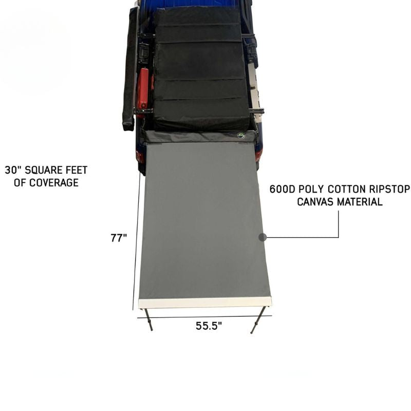 overland-vehicle-systems-nomadic-awning-4.5-ft-gray-open-drone-view-with-ripstop-material-on-vehicle-on-white-background