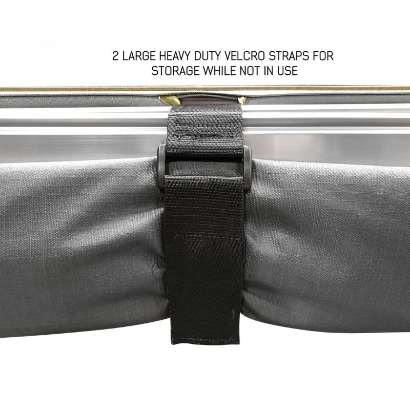 overland-vehicle-systems-nomadic-awning-6.5-ft-gray-closed-close-up-view-with-vcelcro-straps-on-white-background