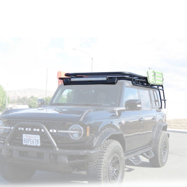 ovs-king-4wd-roof-rack-for-2021-2023-ford-bronco-front-corner-view-with-led-light-bar-and-traction-board-in-nature