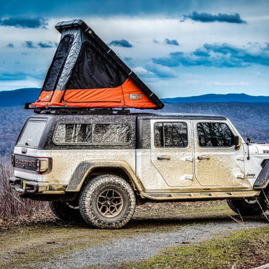 badass-tents-rugged-clamshell-roof-top-tent-open-on-jeep-gladiator