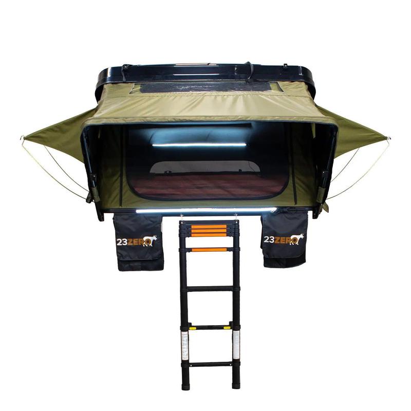 23zero-armadillo-x2-hard-shell-roof-top-tent-open-front-view-with-ladder-and-gear-bags-on-white-background