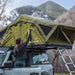 23zero-breezeway-2-0-soft-shell-roof-top-tent-open-side-view-on-ford-bronco-wiht-personin-nature