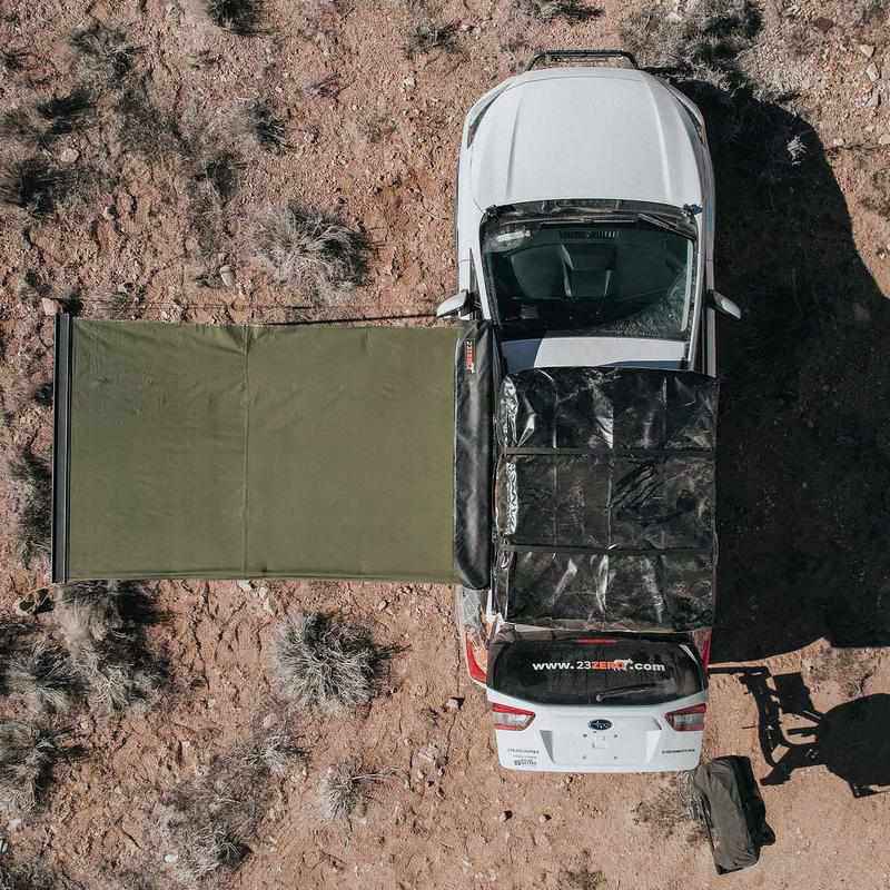 23zero-bushman-car-awning-canopy-78in-x-98in-open-drone-view-on-subaru-crosstrek-in-nature