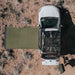 23zero-bushman-straight-pull-awning-90in-x-98in-open-drone-view-on-subaru-crosstrek-in-nature