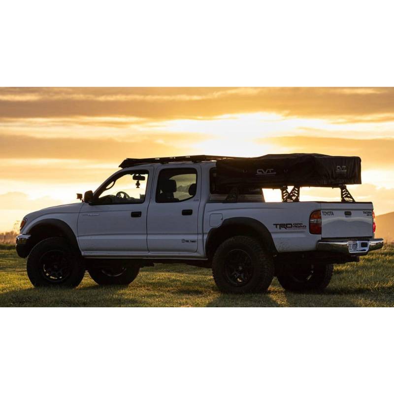 cbi-toyota-tacoma-cbi-overland-bed-bars-1996-2004-side-view-with-roof-top-tent-in-nature