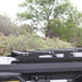 eezi-awn-blade-40th-edition-hard-shell-roof-top-tent-closed-close-up-view-of-k9-roof-rack-in-nature