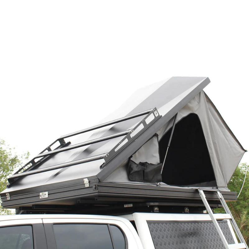 eezi-awn-blade-40th-edition-hard-shell-roof-top-tent-open-side-view-on-a-pick-up-truck-in-nature