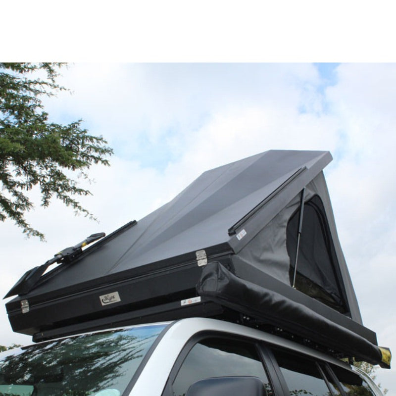 eezi-awn-blade-hard-shell-roof-top-tent-open-front-view-on-vehicle-with-mesh-window