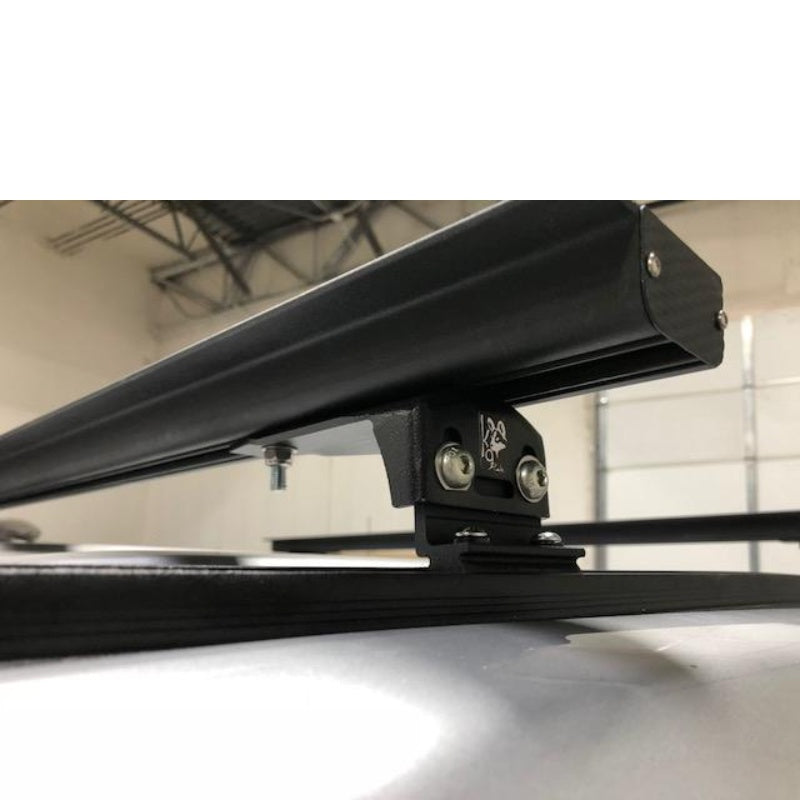 eezi-awn-k9-load-bar-kit-for-lexus-gx-close-up-view-with-load-bar-feet-in-garage