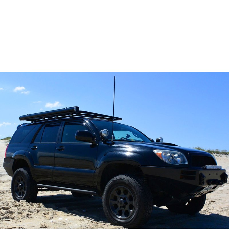 eezi-awn-k9-roof-rack-for-toyota-4runner-4th-gen-front-corner-view-at-the-beach