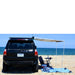 eezi-awn-k9-roof-rack-for-toyota-4runner-4th-gen-rear-view-with-camping-chair-at-the-beach