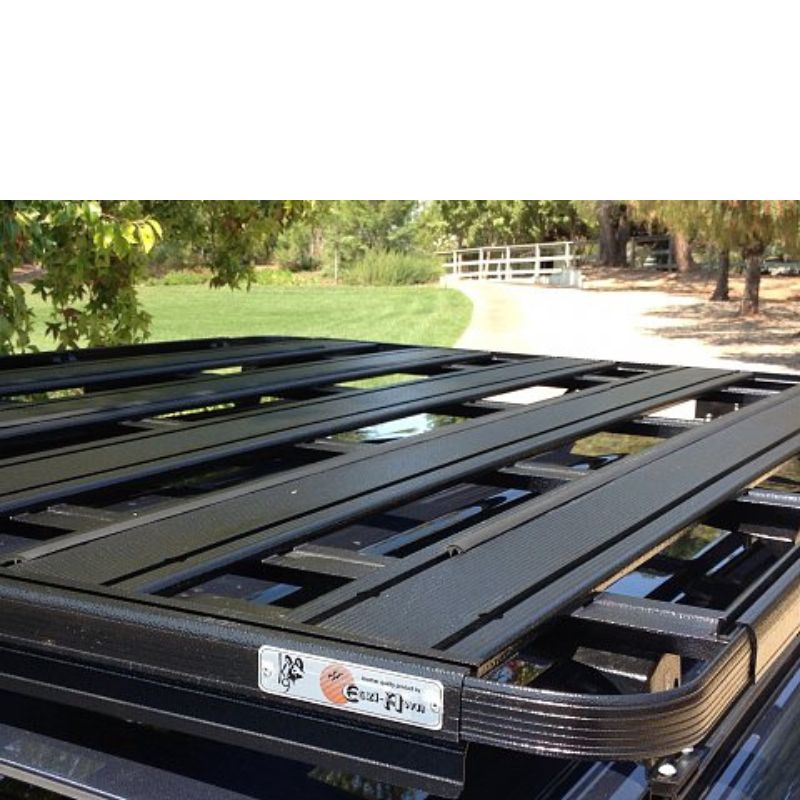 eezi-awn-k9-roof-rack-for-toyota-4runner-5th-gen-close-up-view-with-logo-sticker-in-farm