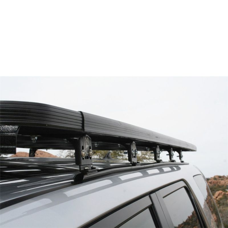 eezi-awn-k9-roof-rack-for-toyota-4runner-5th-gen-close-up-view-with-roof-rack-feet-in-terrain