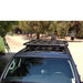 eezi-awn-k9-roof-rack-for-toyota-4runner-5th-gen-front-view-with-sunroof-in-farm