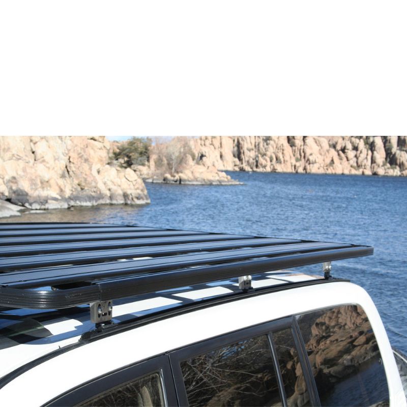 eezi-awn-k9-roof-rack-for-toyota-land-cruiser-100-series-close-up-stainless-steel-construction-in-nature