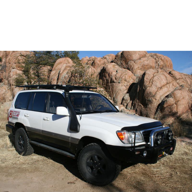 eezi-awn-k9-roof-rack-for-toyota-land-cruiser-100-series-front-corner-view-in-terrain