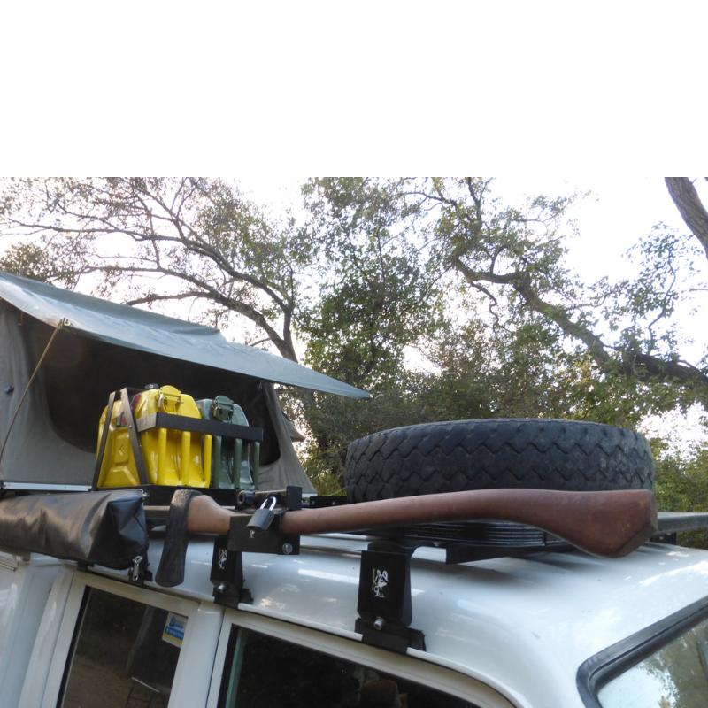 eezi-awn-k9-roof-rack-for-toyota-land-cruiser-70-series-close-up-view-with-awning-and-tent-in-nature