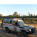 eezi-awn-k9-roof-rack-for-toyota-land-cruiser-70-series-side-view-with-elephants-on-background-in-nature