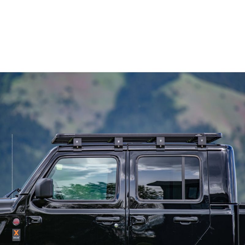eezi-awn-k9-roof-rack-kit-for-jeep-gladiator-close-up-view-with-mountain-at-the-background-in-nature