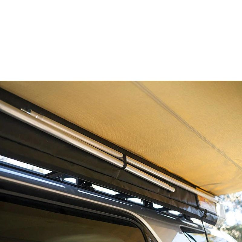 eezi-awn-lite-awning-beige-open-close-up-view-one-vehicle-in-nature