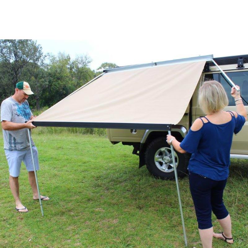 eezi-awn-series-1000-awning-beige-open-side-view-silver-hardcase-with-persons-on-land-cruiser-nature