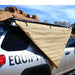 eezi-awn-swift-awning-beige-close-corner-side-close-up-view-on-toyota-4runner-in-terrain