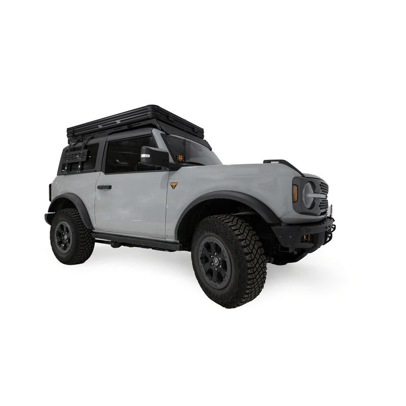 freespirit-recreation-aspen-lite-standard-rooftop-tent-closed-front-corner-view-on-ford-bronco-on-white-background