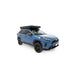 freespirit-recreation-aspen-lite-standard-rooftop-tent-closed-front-corner-view-on-toyota-rav4-on-white-background