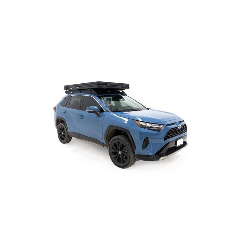 freespirit-recreation-aspen-lite-standard-rooftop-tent-closed-front-corner-view-on-toyota-rav4-on-white-background