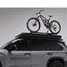 freespirit-recreation-aspen-v2-hard-shell-roof-top-tent-black-closed-side-view-on-top-toyota-sequoia-with-bike-on-white-background