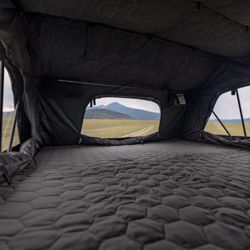 freespirit-recreation-high-country-v2-king-hybrid-roof-top-tent-open-interior-view-with-quilted-mattress