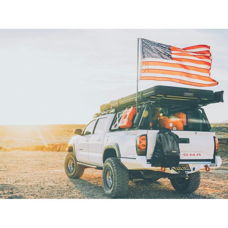 leitner-acs-flagpole-rear-corner-view-on-toyota-tacoma-in-terrain