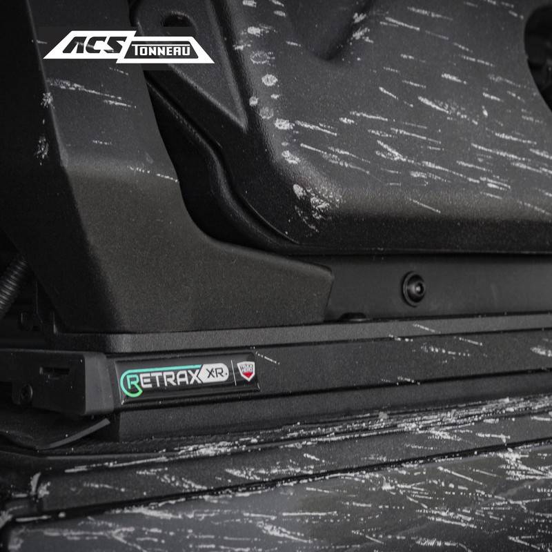 leitner-acs-forged-tonneau-bed-rack-for-ram-close-up-view-with-sticker-logo