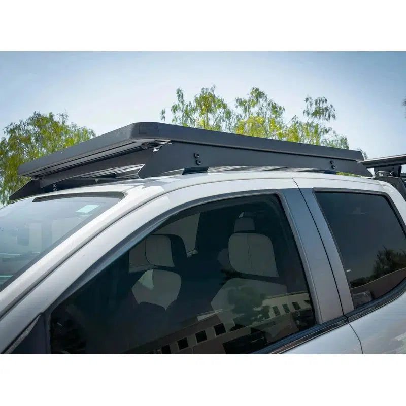 leitner-acs-roof-over-cab-platform-rack-for-2023-chevrolet-colorado-side-view-in-nature