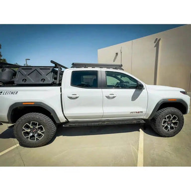 leitner-acs-roof-over-cab-platform-rack-for-2023-chevrolet-colorado-side-view-in-parking-lot