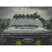 leitner-acs-roof-over-cab-platform-rack-for-ford-f250-front-view-with-fairing-lights-in-nature