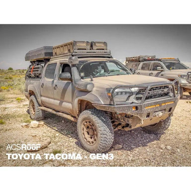 leitner-acs-roof-over-cab-platform-rack-for-toyota-tacoma-gen3-front-corner-view-in-terrain