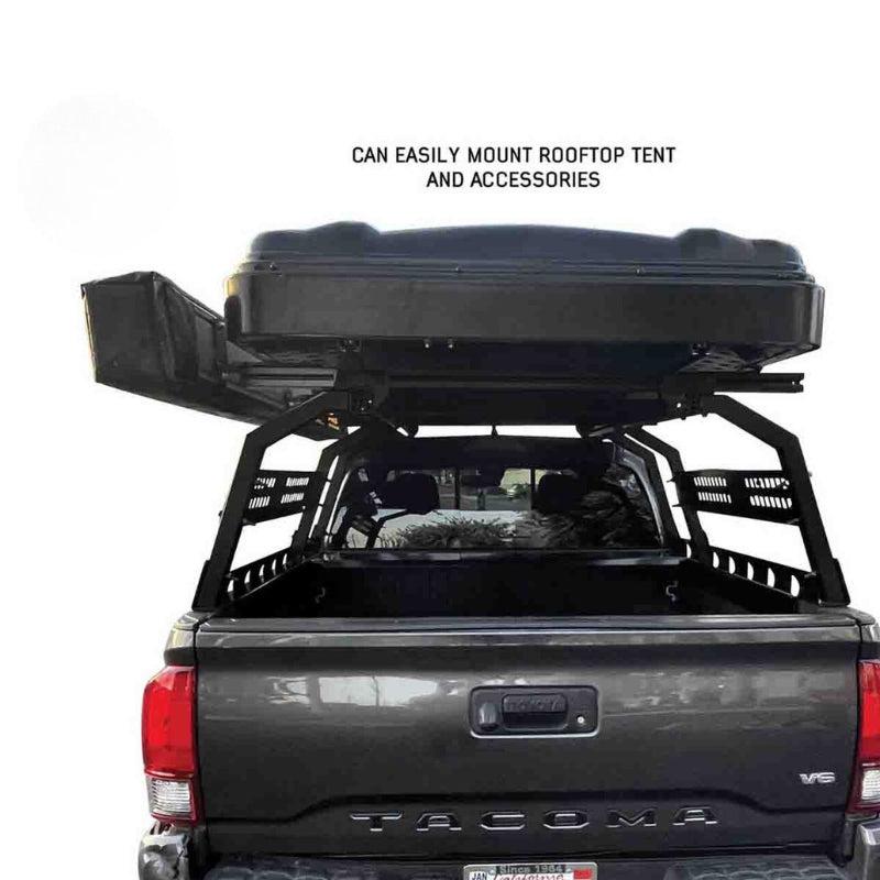 overland-vehicle-systems-discovery-rack-full-size-truck-short-bed-rear-view-on-toyota-tacoma-on-white-background