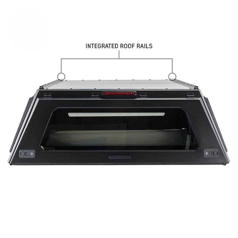 overland-vehicle-systems-expedition-truck-cap-for-2007-toyota-tundra-black-closed-rear-view-with-integrated-roof-rails-on-white-background