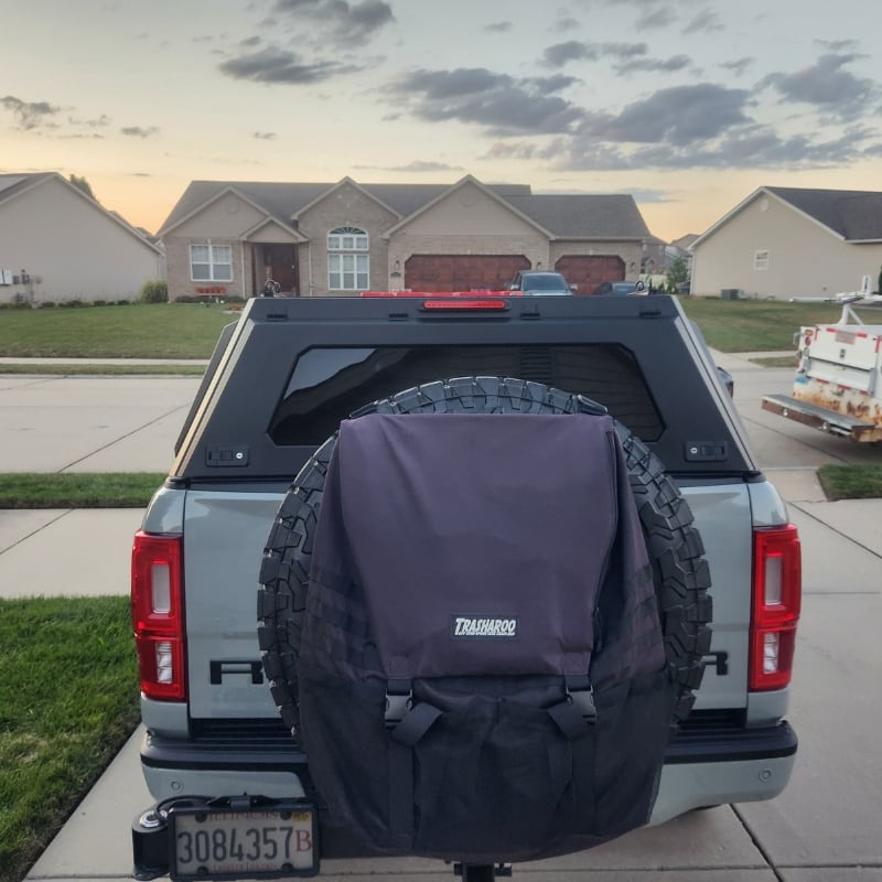 overland-vehicle-systems-expedition-truck-cap-for-ford-ranger-black-rear-view-on-truck-in-driveway