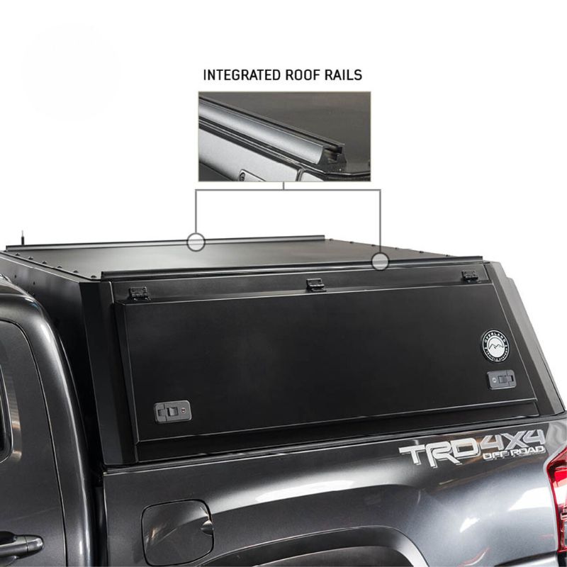 overland-vehicle-systems-expedition-truck-cap-for-toyota-tacoma-black-close-side-view-with-description-on-vehicle-on-white-background