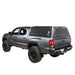overland-vehicle-systems-expedition-truck-cap-for-toyota-tacoma-black-open-rear-corner-view-on-toyota-tacoma-plain-white-background