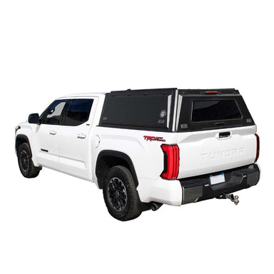 overland-vehicle-systems-expedition-truck-cap-for-toyota-tundra-black-closed-rear-corner-view-on-white-background