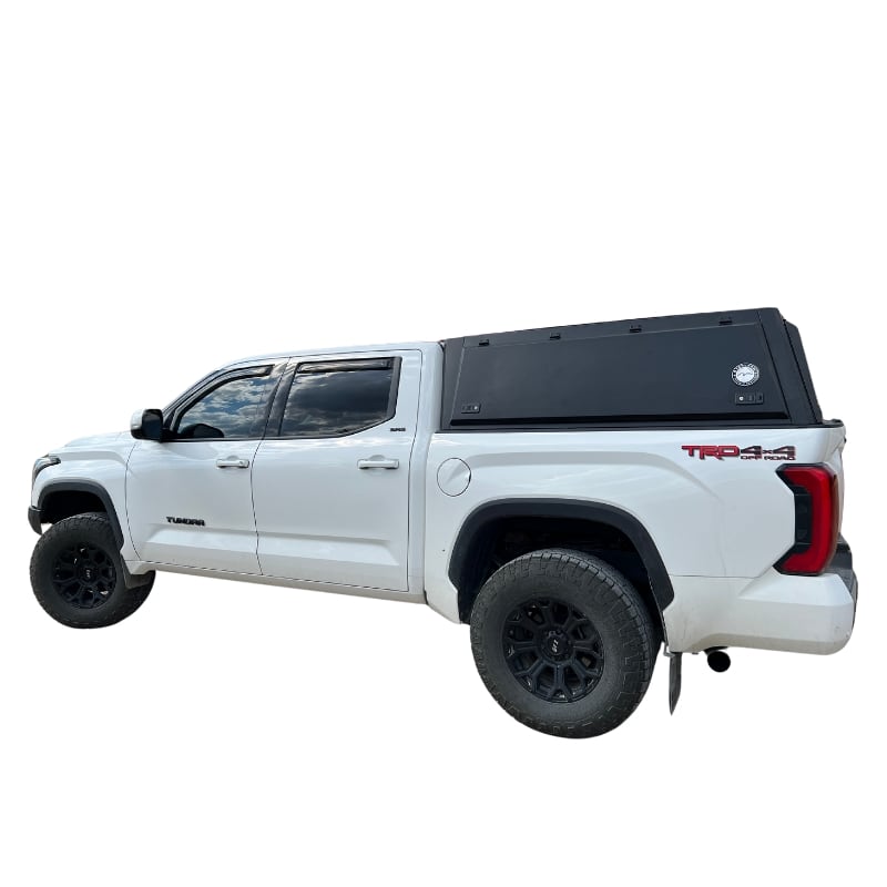 overland-vehicle-systems-expedition-truck-cap-for-toyota-tundra-side-view-on-white-background