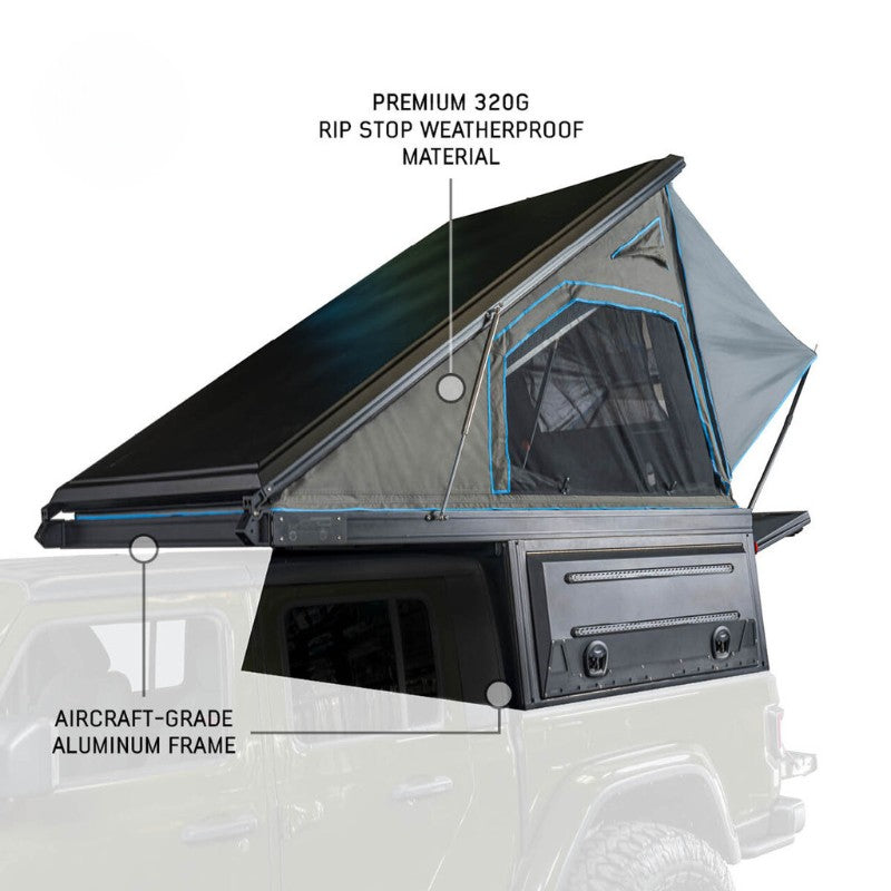 overland-vehicle-systems-magpak-camper-shell-roof-top-tent-for-gm-colorado-canyon-open-front-corner-view-with-description-on-white-background