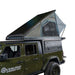 overland-vehicle-systems-magpak-camper-shell-roof-top-tent-for-jeep-gladiator-open-side-view-on-white-backgound