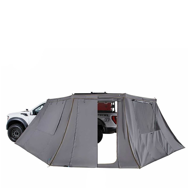 overland-vehicle-systems-nomadic-180-lte-awning-wall-with-windows-open-front-corner-view-on-vehicle-with-half-doors-on-white-background
