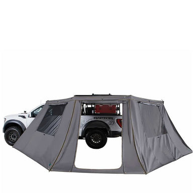 overland-vehicle-systems-nomadic-180-lte-awning-wall-with-windows-open-front-corner-view-with-wide-door-on-white-background