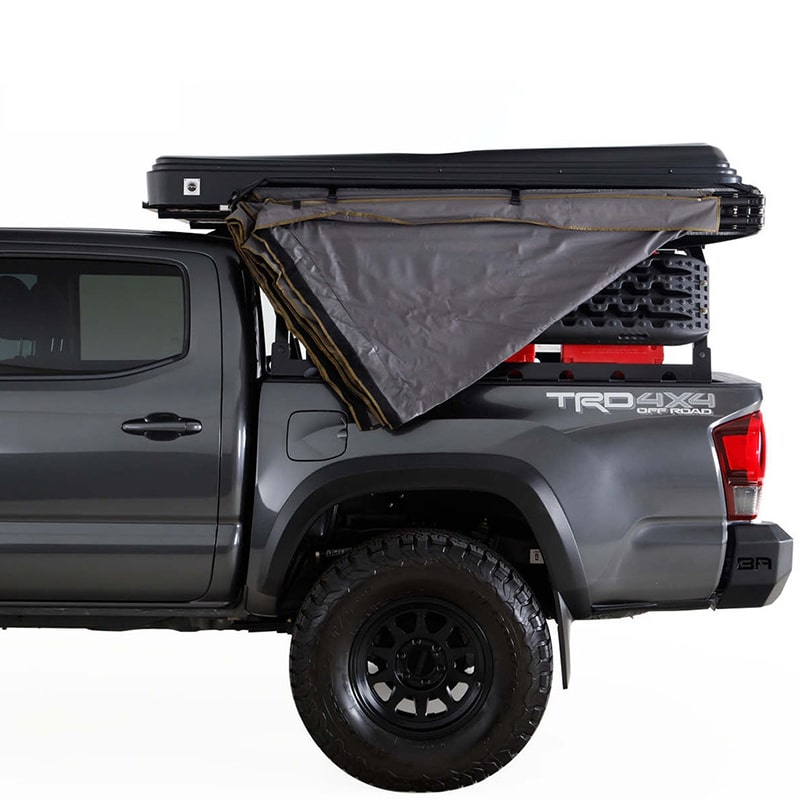 overland-vehicle-systems-nomadic-270lte-awning-driver-side-toyota-tacoma-side-view-opened-unzipped-close-up